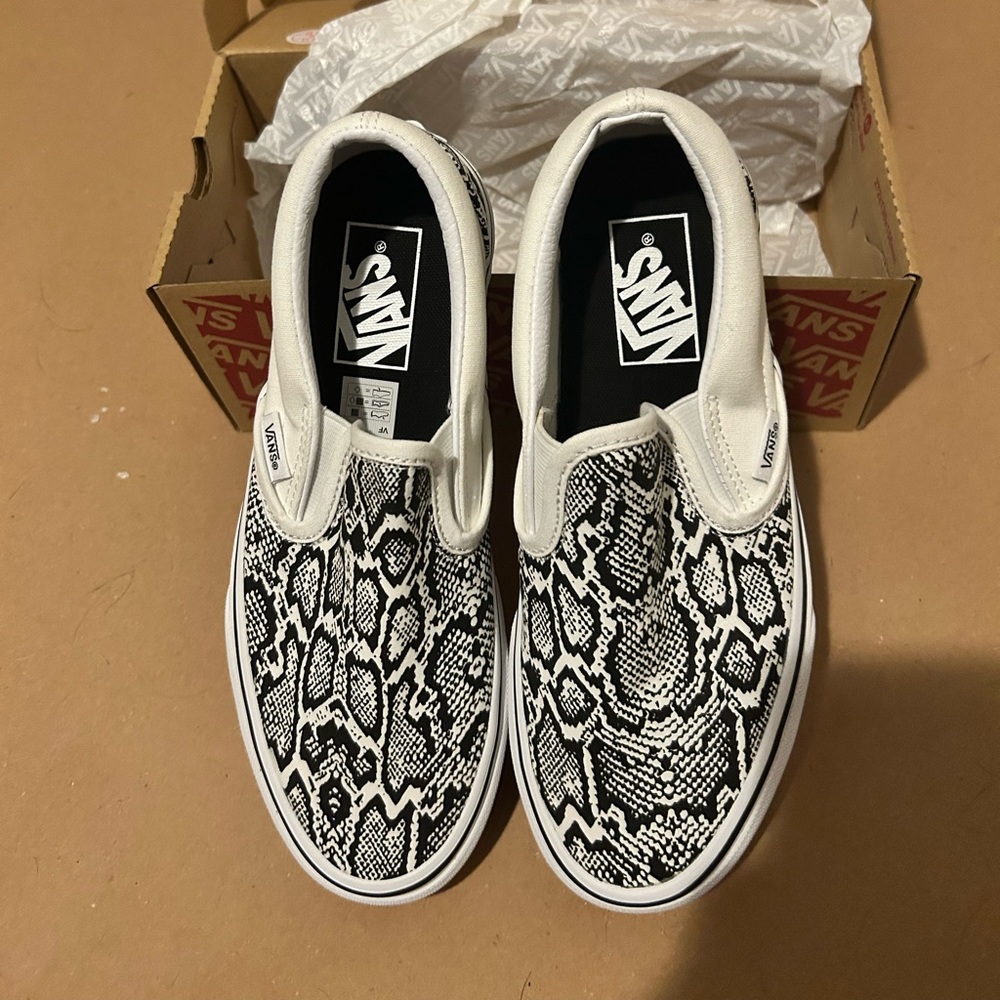 Womens size 6.5 Vans Snake Print Slip ons NWOT Original box included.
